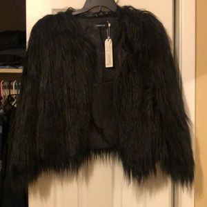Black faux fur coat